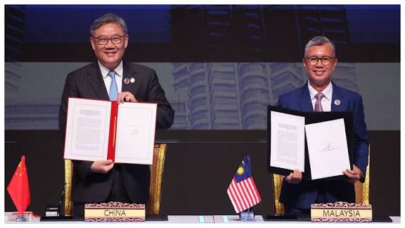 China and ASEAN nations sign a maritime trade pact to boost shipping links.